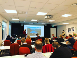 Sarah Kelly presents at a conference in Oslo